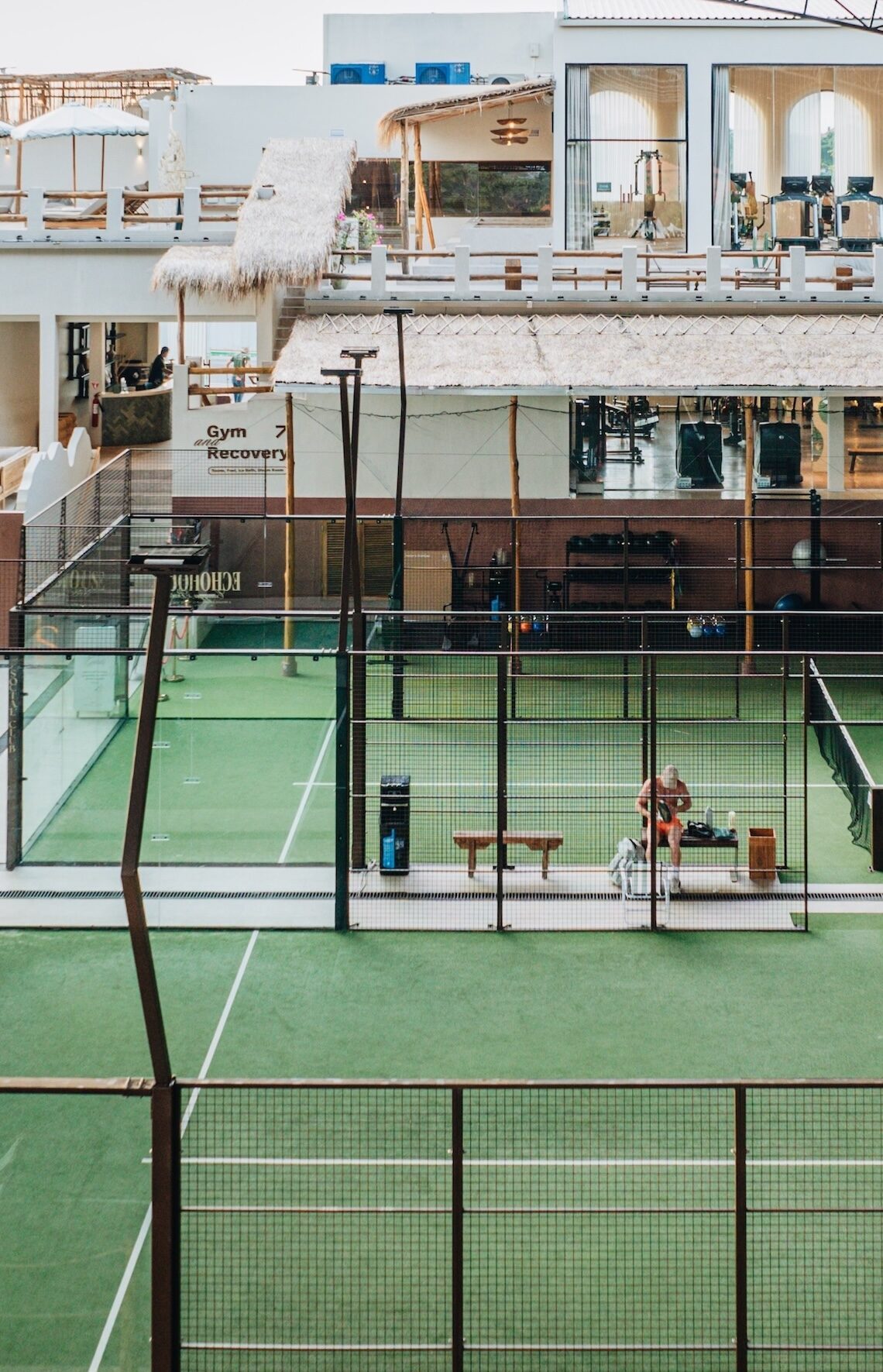 Rooftop padel courts among city buildings